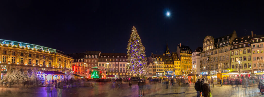 Strasbourg Christmas market and large Christmas tree at Place Kléber at night