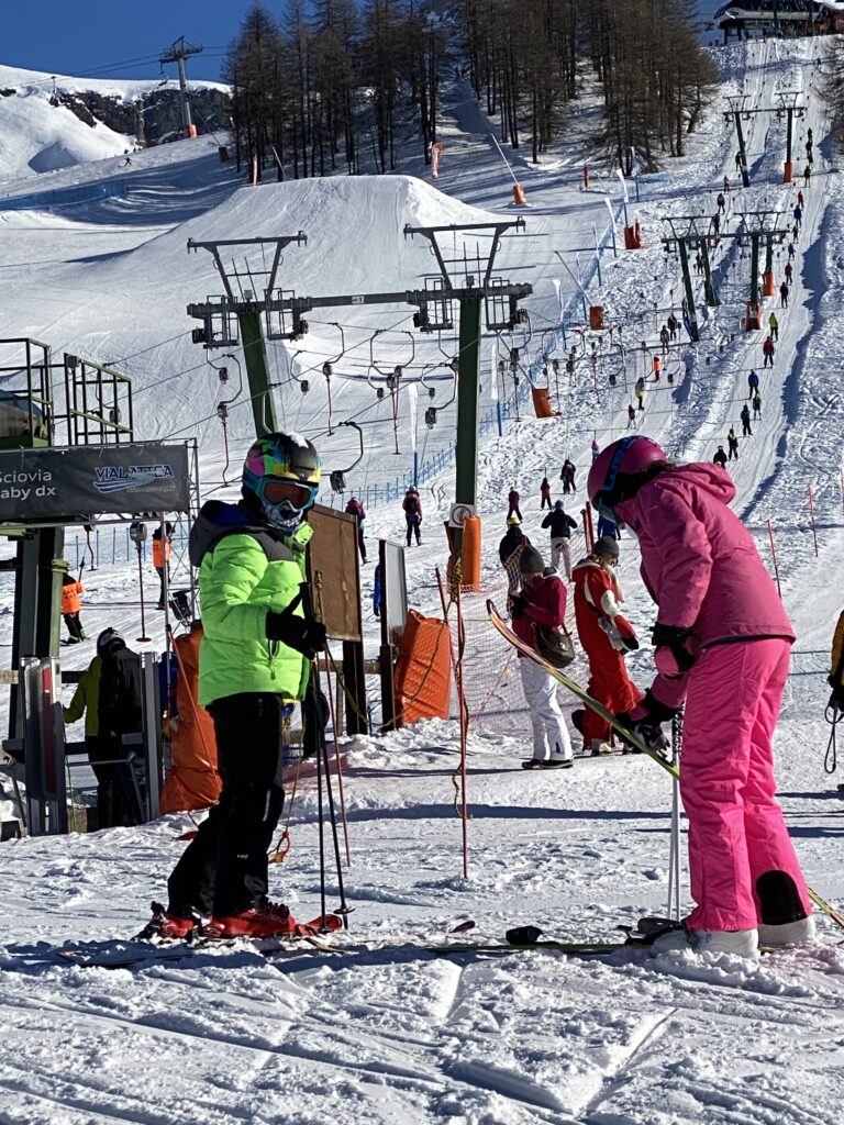 Child skier r on the beginner slopes in Sestriere, Italy
