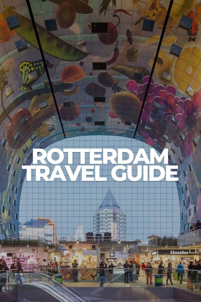 Interior of Rotterdam Markthal with its colorful arched ceiling and food stalls in Rotterdam, Netherlands.