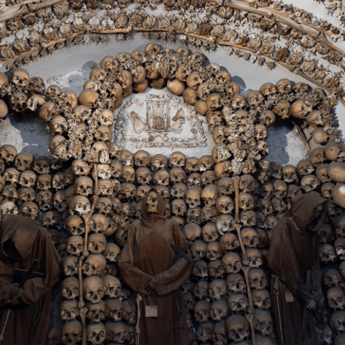 Capuchin Crypt bone chapel interior with monks and skull decorations in Rome