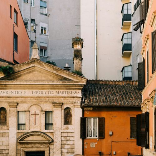 Monti neighborhood street with historic buildings in Rome