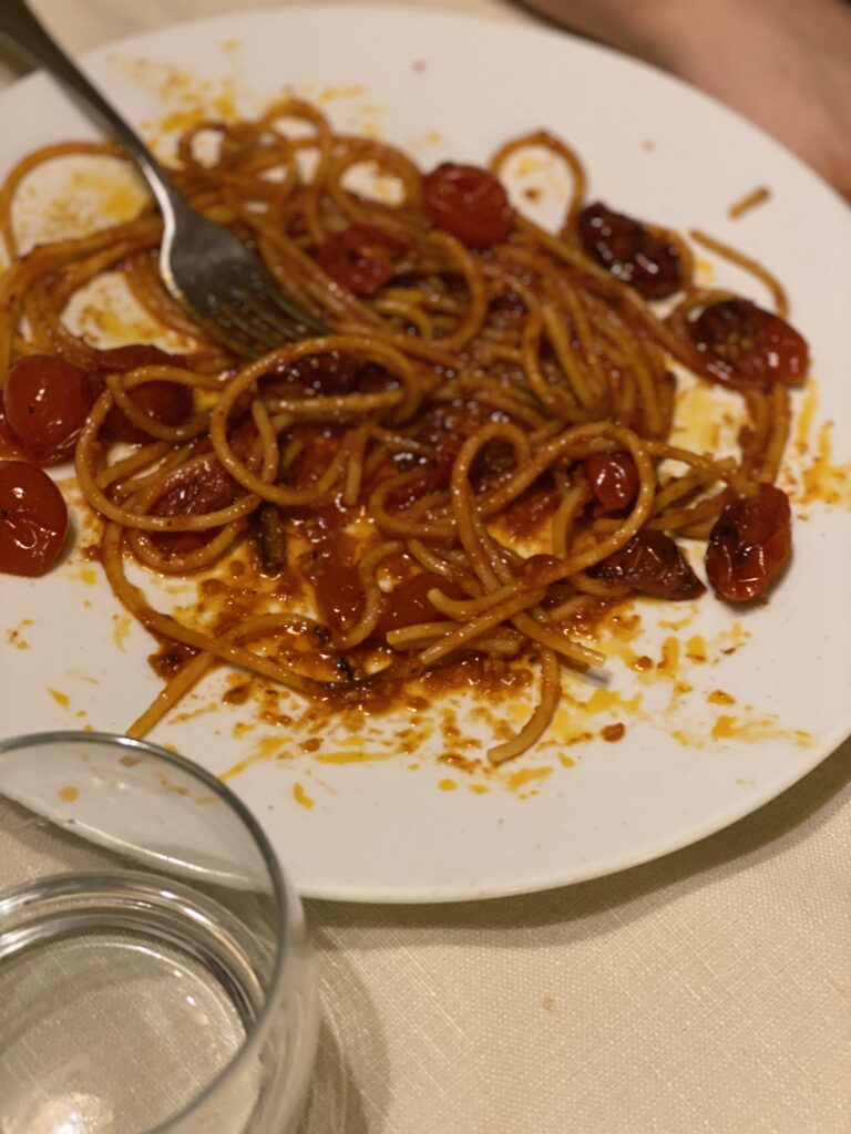 Spaghetti all assassina at a cave restaurant in Matera Italy