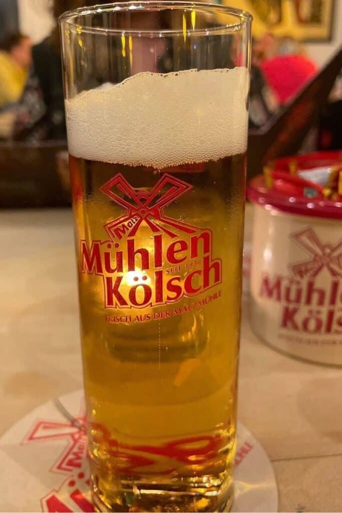 A Sion Kölsch beer in the traditional small Stange glass at a Cologne beer hall