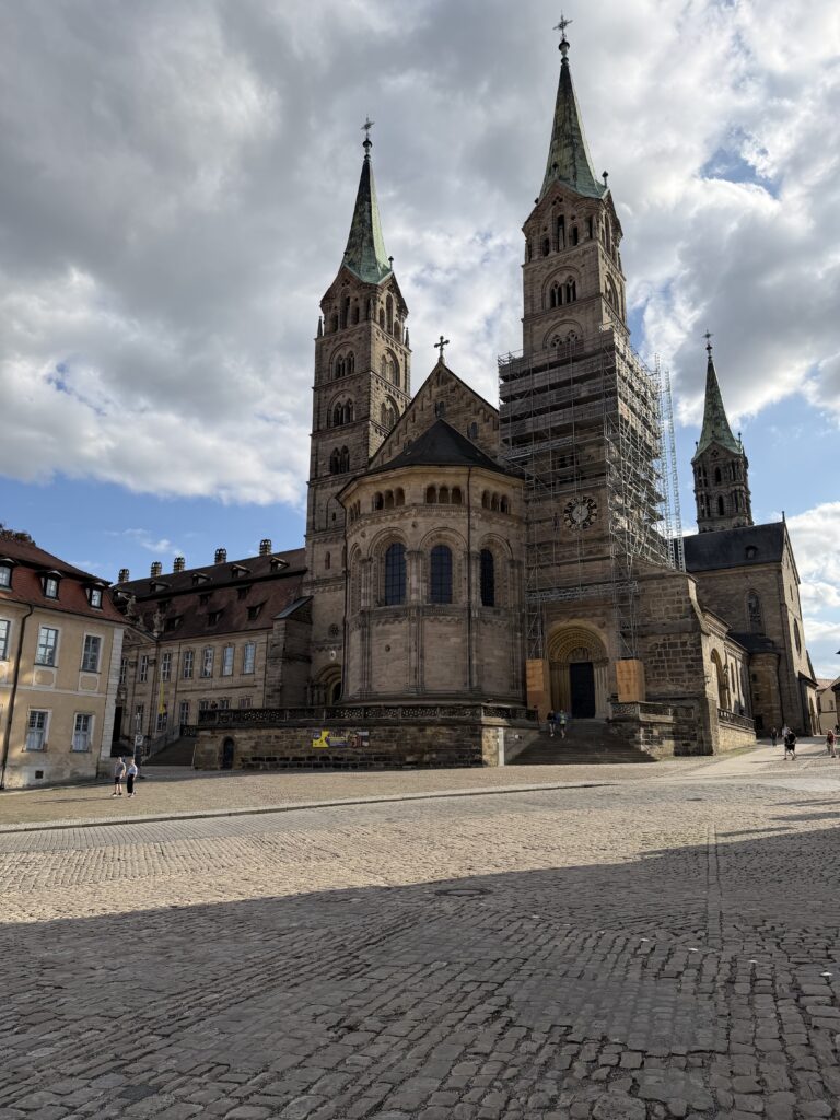 Four spires of Bamberg Cathedral rising above the historic city center