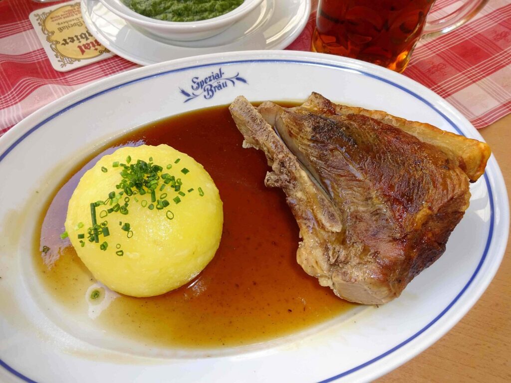 Roast meat with potato dumpling and gravy at Brauerei Spezial in Bamberg