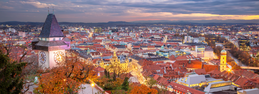 Panoramic view of Graz Old Town and the Kunsthaus Graz (Friendly Alien) seen from Schlossberg in Graz, Austria.