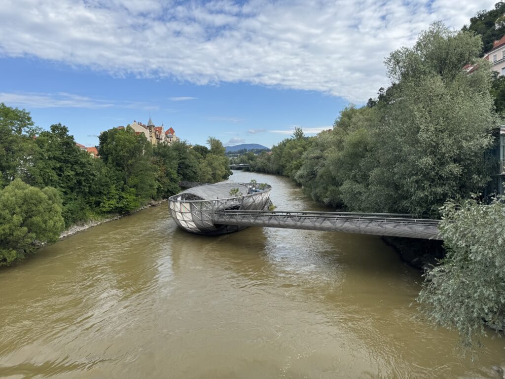 Murinsel floating island and pedestrian bridge on the Mur River in Graz