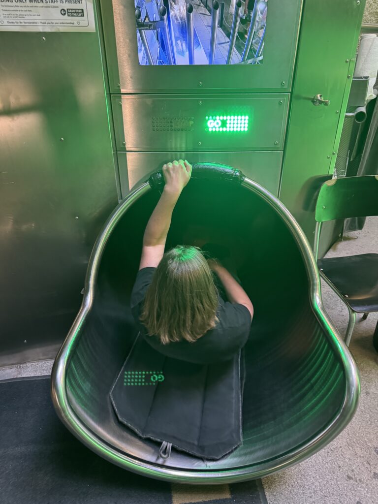 Riding the Schlossberg Slide attraction inside Schlossberg in Graz