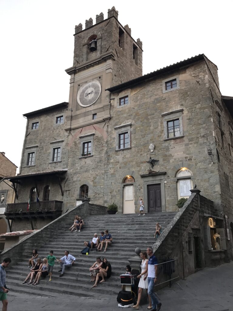Historic Palazzo Comunale and stone staircase in Cortona, Tuscany