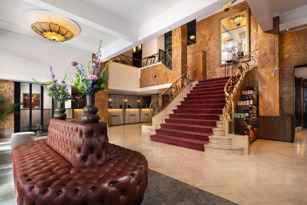 Lobby and grand staircase at NH Atlanta Rotterdam
