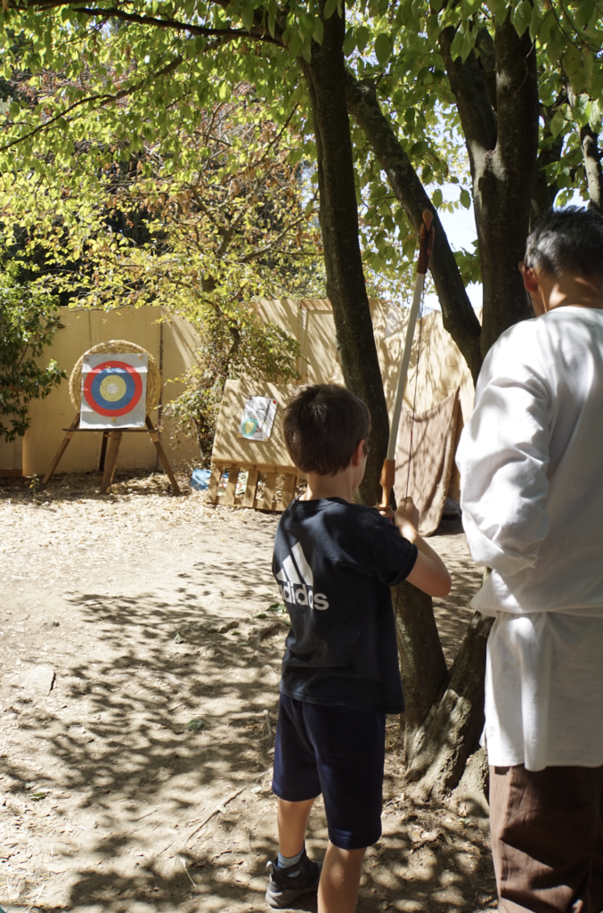 Archery lesson for kids at Volterra's AD 1398 medieval festival