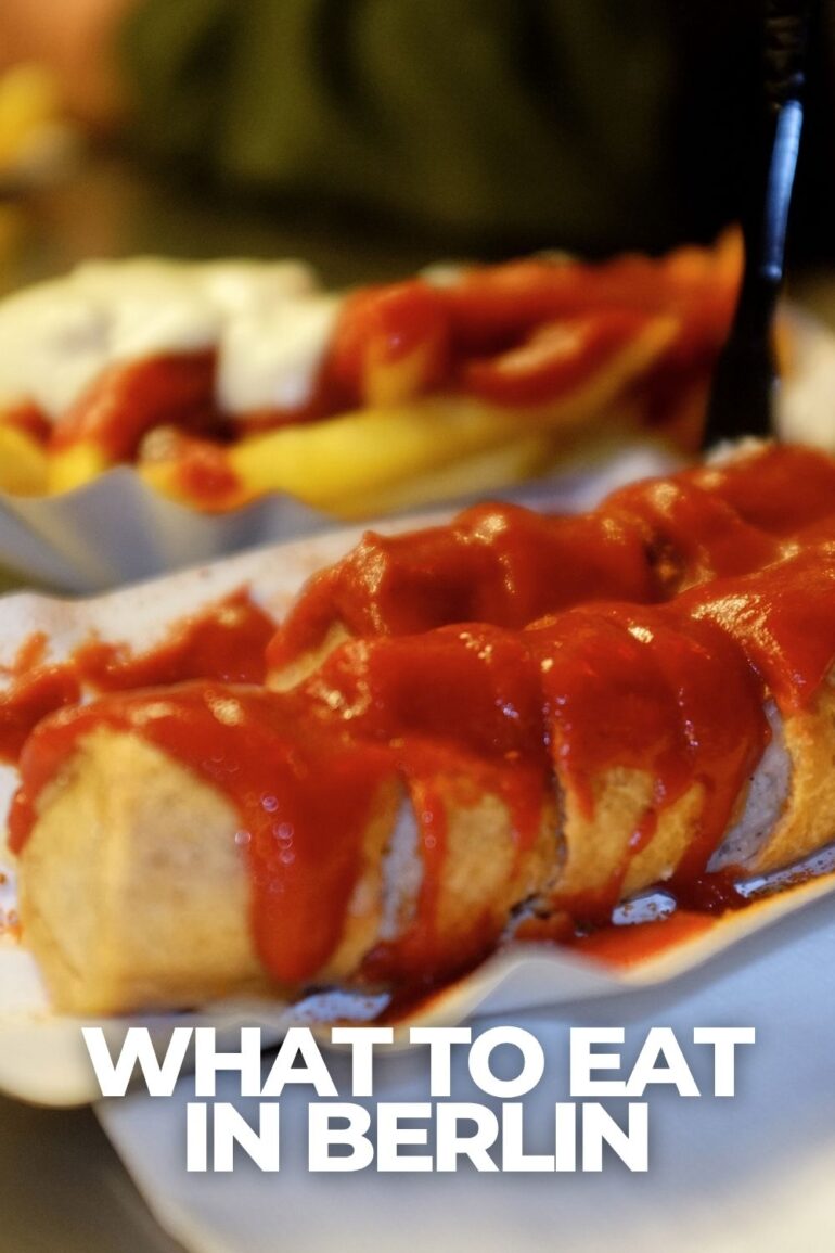 Currywurst with fries served with ketchup in Berlin