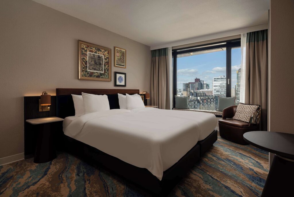 Guest room at Haven Hotel Rotterdam with city views