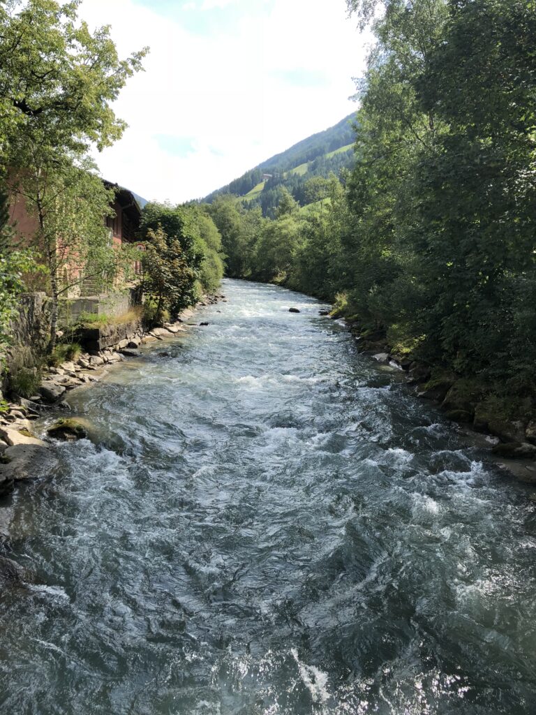 Mountain river running through the Ahrntal Valley near Alpenpalace
