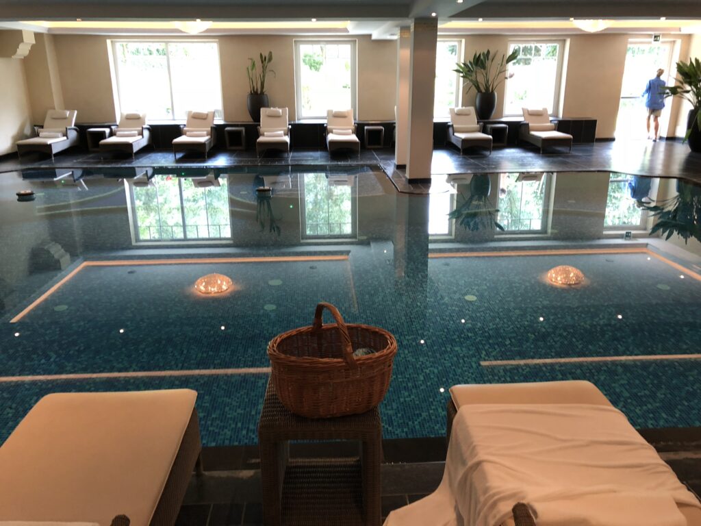 Indoor swimming pool and relaxation area at Alpenpalace in South Tyrol