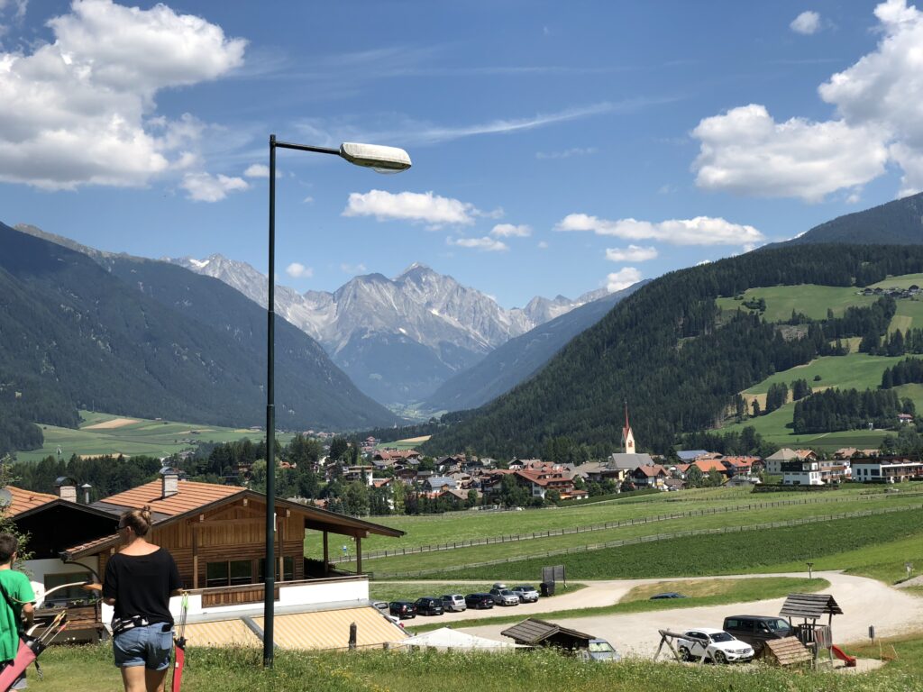 Mountain village and surrounding peaks in South Tyrol, Italy
