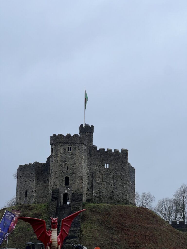 Norman keep at Cardiff Castle with the Welsh flag flying above it