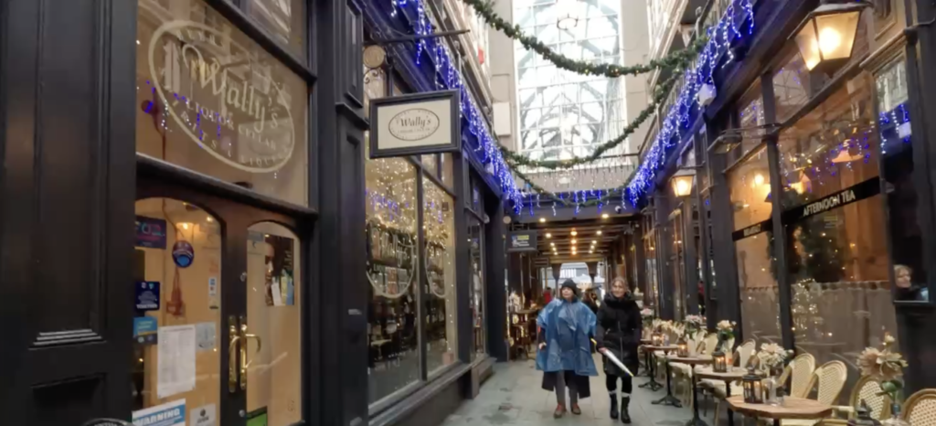 Covered shopping arcade decorated for Christmas in central Cardiff, Wales