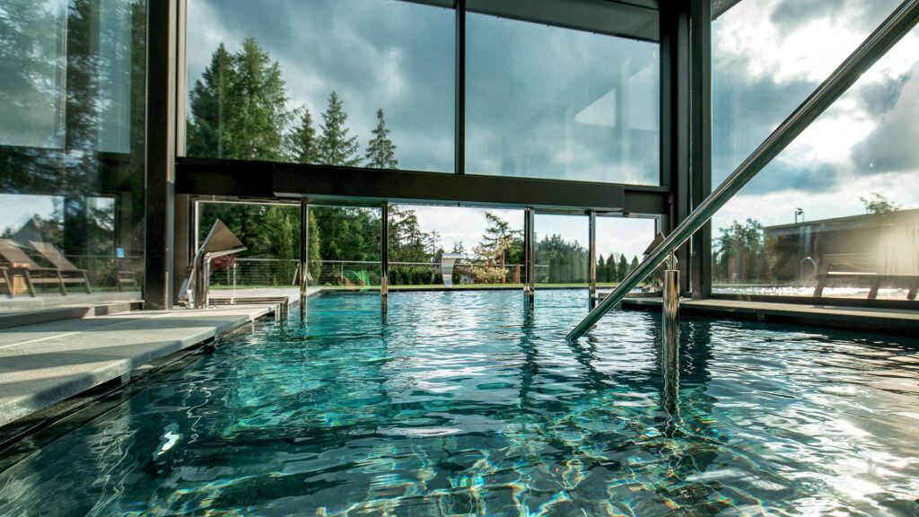 Indoor-outdoor swimming pool at Josef Mountain Resort in Avelengo, South Tyrol