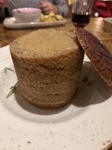 Wild mushroom soup served in a hollowed-out loaf of dark Lithuanian rye bread at Etno Dvaras in Vilnius