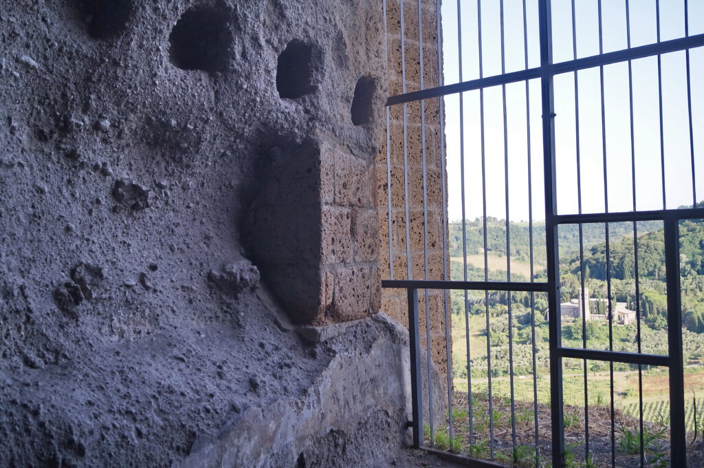 Pigeon niches carved into the tufa rock inside Orvieto Underground